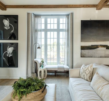 living room with white frame a-series window