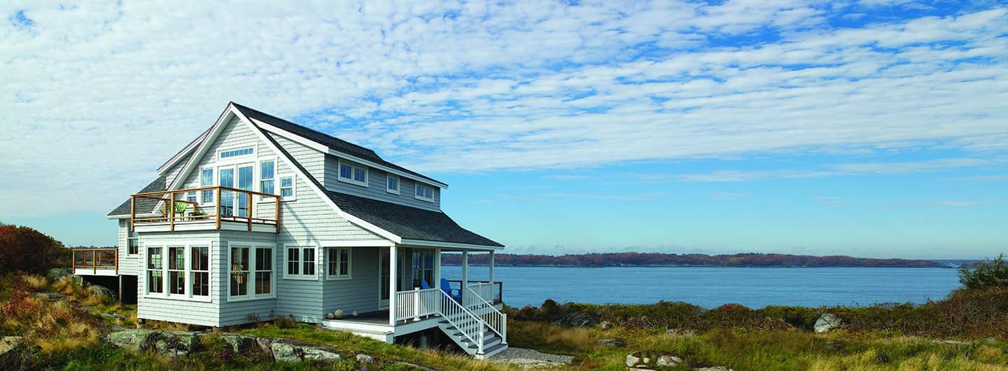 two story beach house with andersen coastal stormwatch windows