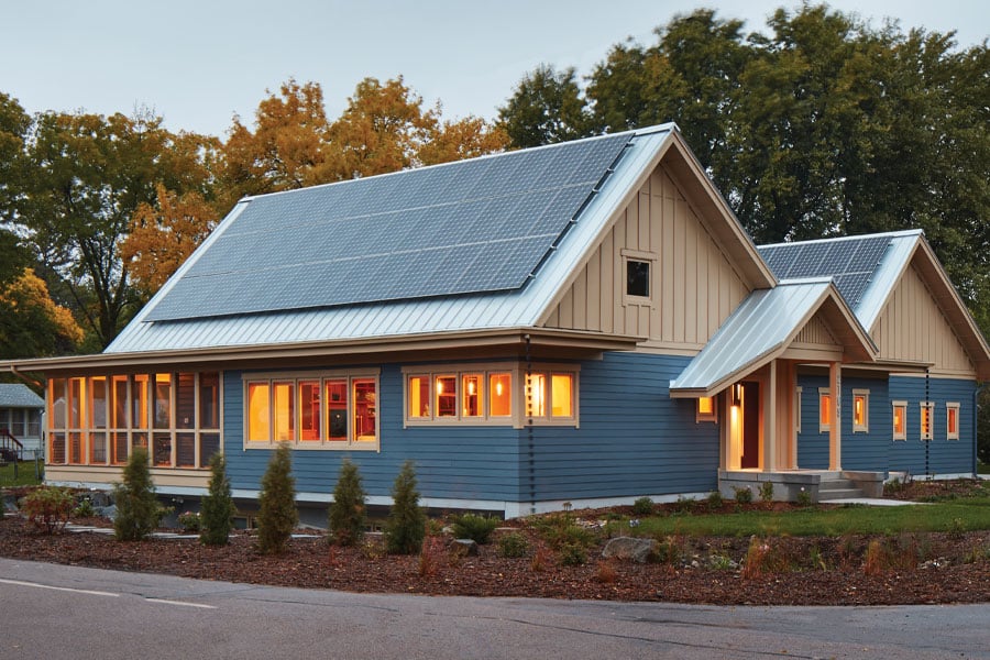 blue home on corner lot with Andersen windows